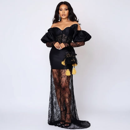 Vestido de sirena con lentejuelas y encaje negro y hombros descubiertos 